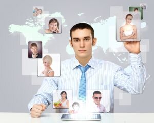 Business person against technology background